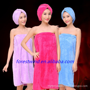 black white bath towels and towel wrap with straps